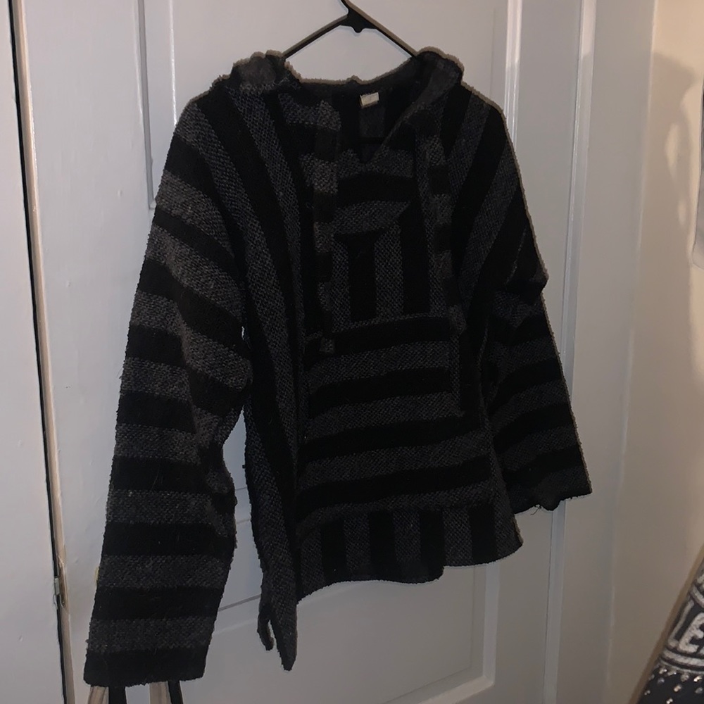 “drug rug” sweater